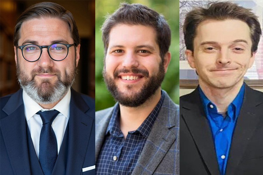 Three new male faculty members wear suits and face the cameral smiling