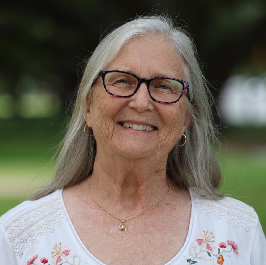 women in glasses smiling