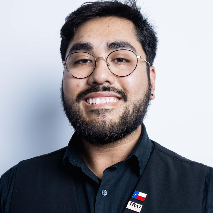 man wearing glasses smiling