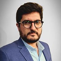 man in glasses looking at camera