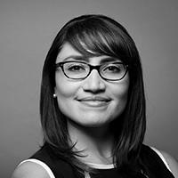 woman wearing glasses smiling