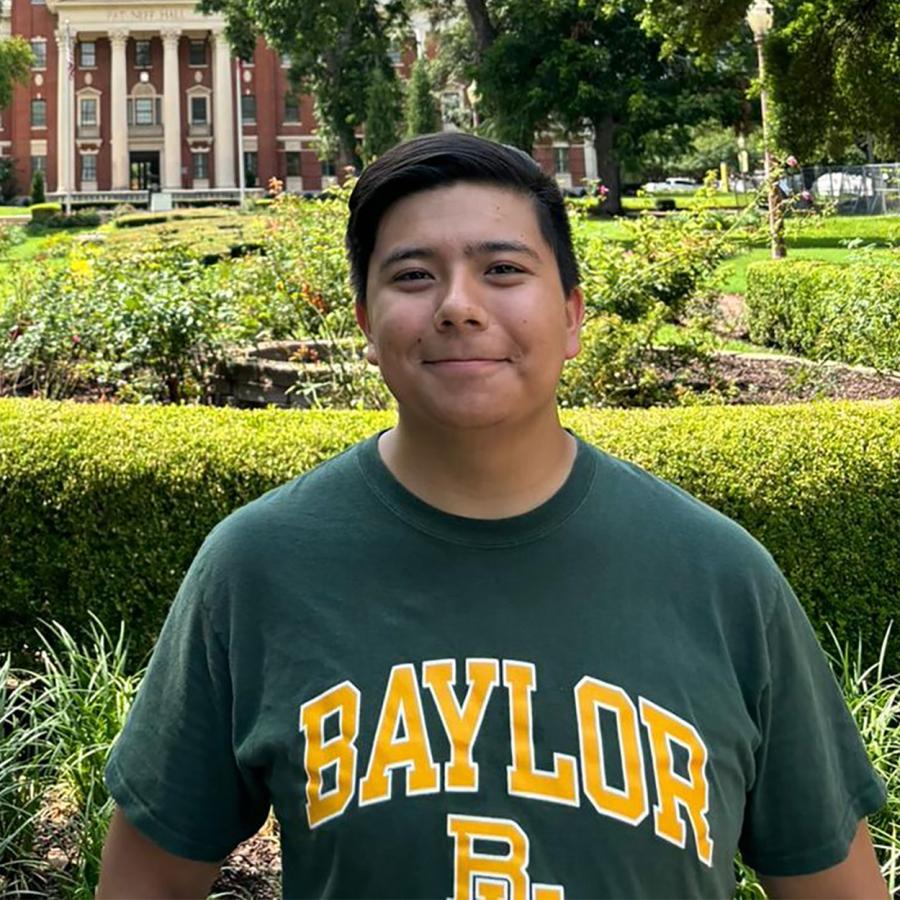 man smiling in Baylor shirt