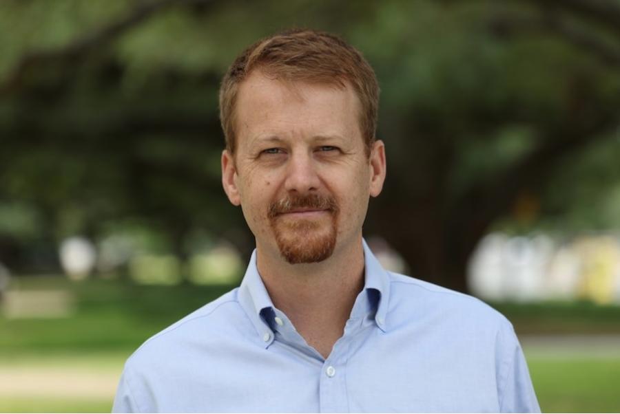 Dr. Robert Elder smiles at the camera in a headshot